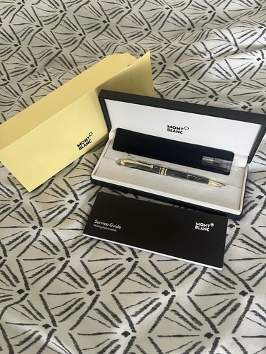 Black and gold montblanc - and,